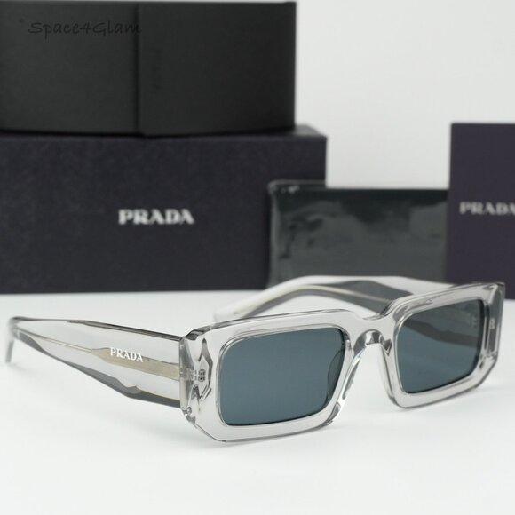 BRAND NEW Prada PR06YS 12R09T Transparent Grey Rectangle Unisex Sunglasses - Picture 1 of 10